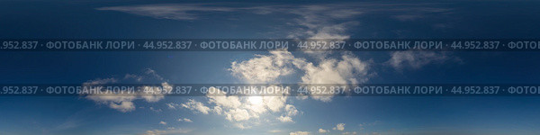 Blue sky panorama with puffy Cumulus clouds. Seamless hdr pano in spherical equirectangular format. Sky dome or zenith for 3D visualization, game and sky replacement for aerial drone 360 panoramas. Стоковое фото, фотограф Вера Грабчук / Фотобанк Лори