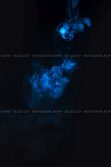 blue smoke against black background. Стоковое фото, агентство Ingram Publishing / Фотобанк Лори