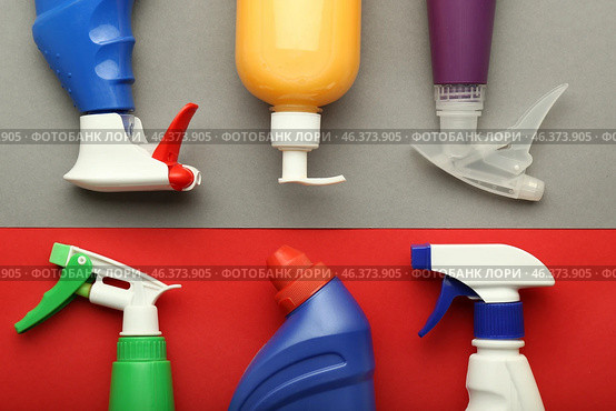 Bottles with detergents on color background, flat lay. Стоковое фото, фотограф Pixel_shot / Фотобанк Лори