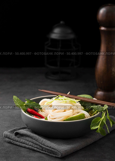 bowl noodles with chopsticks copy space. Стоковое фото, агентство Ingram Publishing / Фотобанк Лори