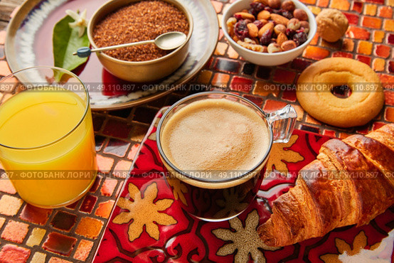 Breakfast continental with croissant coffe and orange juice. Стоковое фото, агентство Ingram Publishing / Фотобанк Лори