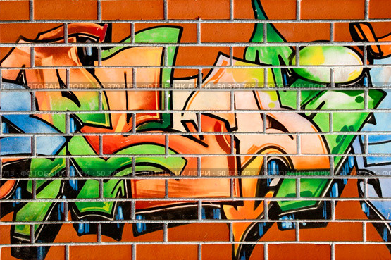 Brick-wall painted with grafitti - abstract background. Стоковое фото, агентство Ingram Publishing / Фотобанк Лори