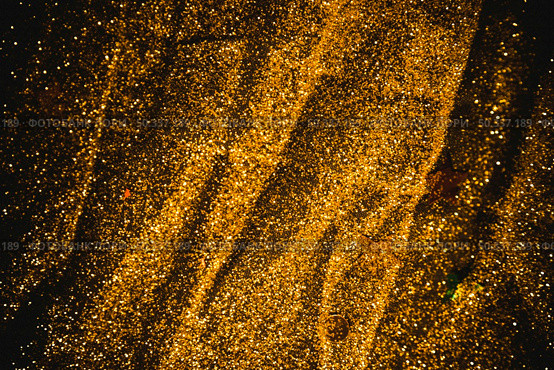 bright sequins scattered black table. Стоковое фото, агентство Ingram Publishing / Фотобанк Лори