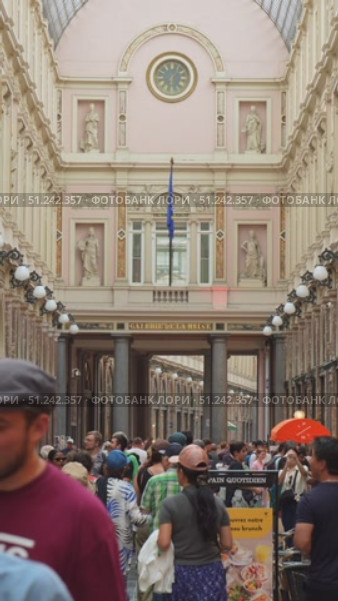BRUSSELS, BELGIUM - JUNE 14, 2025: Royal Saint-Hubert Galleries and People. Shopping Arcades. Brussels, Belgium. Vertical Video. Редакционное видео, видеограф Максим Забаровский / Фотобанк Лори