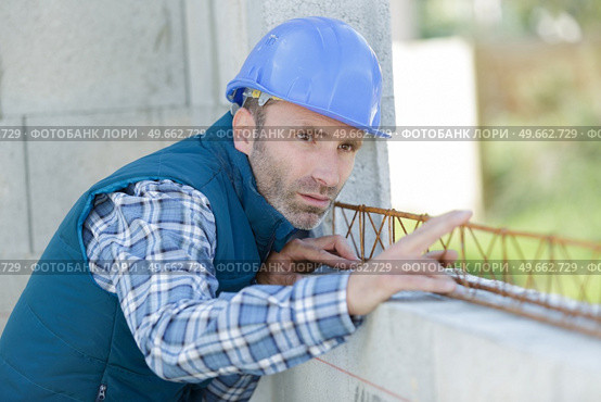 builder at the reconstruction area. Стоковое фото, агентство Ingram Publishing / Фотобанк Лори