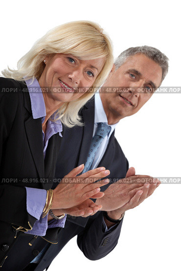Business professionals clapping their hands. Стоковое фото, агентство Ingram Publishing / Фотобанк Лори
