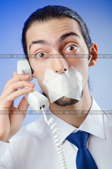 Businessman with his lips sealed. Стоковое фото, агентство Ingram Publishing / Фотобанк Лори