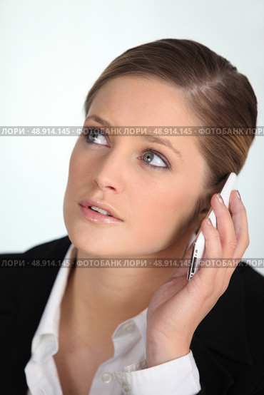 Businesswoman talking on the phone. Стоковое фото, агентство Ingram Publishing / Фотобанк Лори
