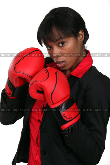 businesswoman with boxing gloves. Стоковое фото, агентство Ingram Publishing / Фотобанк Лори