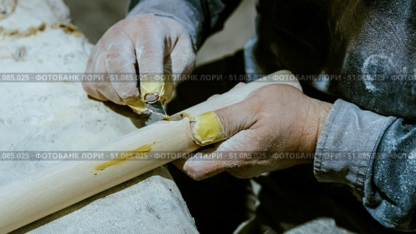 carpenter using nail gun or brad nailer tool on wood box in a workshop ,furniture restoration woodworking concept. selective focus. Стоковое фото, фотограф Feruza Tashmetova / Фотобанк Лори