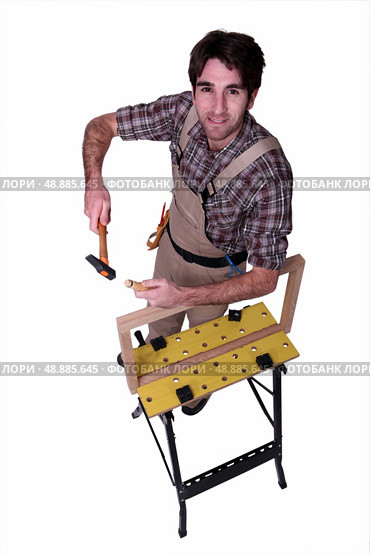 Carpenter with a workbench. Стоковое фото, агентство Ingram Publishing / Фотобанк Лори