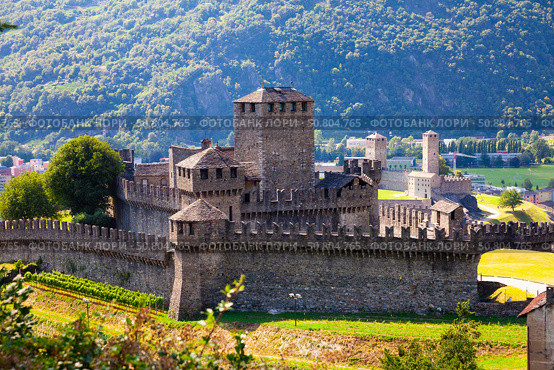 Castles of Bellinzona are group of fortifications located around the town of Bellinzona, capital of the Swiss canton of Ticino. Стоковое фото, фотограф Яков Филимонов / Фотобанк Лори