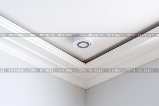 Ceiling close-up. Classic interior. LED Retrofit Bulb into Ceiling Fixture. Cornice. Installing. Decorative Ceiling crown molding intersection. Wall Corner Architecture Decor. Angular ceiling skirting. Стоковое AI-изображение, AI-художник Марина Демидюк / Фотобанк Лори
