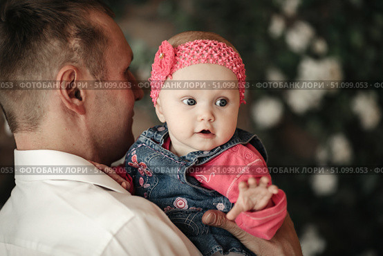 Cherished Daughter, Father Holds Cute Baby Girl Indoor, Soft Light. Стоковое фото, фотограф Aleksandr Golubev / Фотобанк Лори