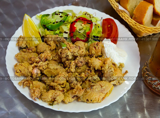 Chipirones battered fried baby squid. Стоковое фото, фотограф Яков Филимонов / Фотобанк Лори