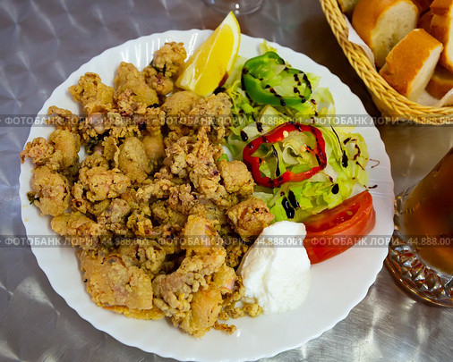 Chipirones battered fried baby squid. Стоковое фото, фотограф Яков Филимонов / Фотобанк Лори