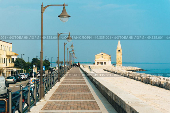 Church of Our Lady of the Angel on the beach of Caorle Italy, Santuario della Madonna dell’Angelo. Стоковое фото, агентство Ingram Publishing / Фотобанк Лори