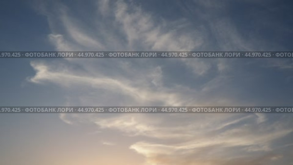 Cirrus Ci is genus of high cloud made of ice crystals, appear delicate wispy white strands. Cirrus formed when warm dry air rises, water vapor deposition onto dust particles at high altitudes. Стоковое видео, видеограф Юлия Петровская / Фотобанк Лори