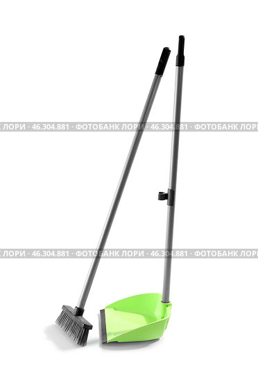 Cleaning broom with green dustpan on white background. Стоковое фото, фотограф Pixel_shot / Фотобанк Лори