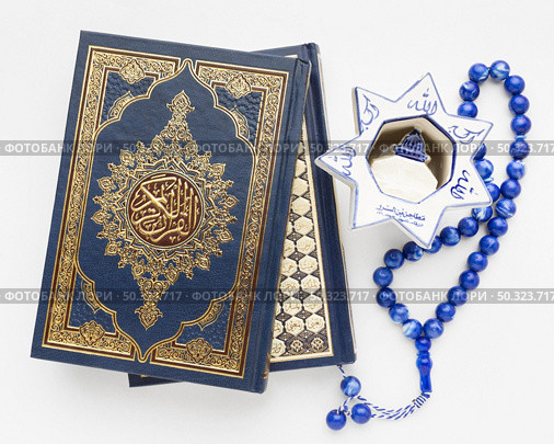 close up islamic new year concept with quran book. Стоковое фото, агентство Ingram Publishing / Фотобанк Лори