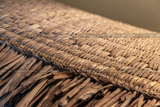 Close-Up of a Woven Thatch Surface Displaying Detailed Craftsmanship. Стоковое фото, фотограф EugeneSergeev / Фотобанк Лори