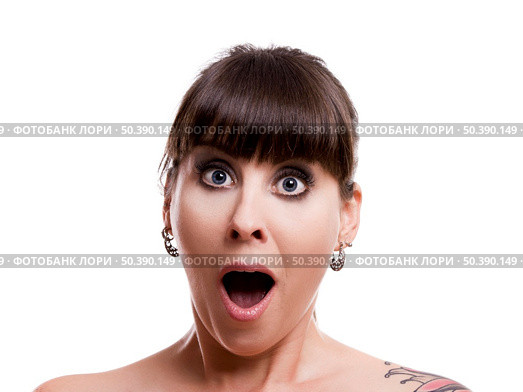 Close-up portrait of a lovely woman with a astonish expression against white background. Стоковое фото, агентство Ingram Publishing / Фотобанк Лори