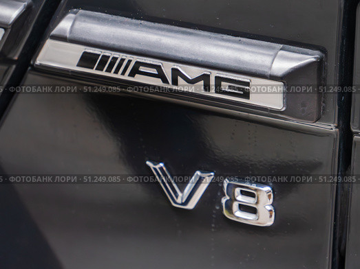 Close-Up View of AMG V8 Engine Badge (2024 год). Редакционное фото, фотограф Sergakoff / Фотобанк Лори