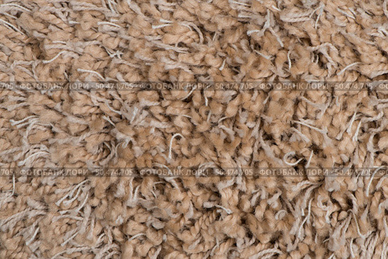 Closeup detail of brown carpet texture background. Стоковое фото, агентство Ingram Publishing / Фотобанк Лори