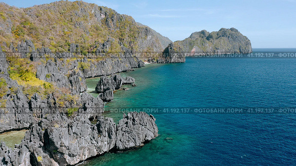 Coastline near hidden Beach, El Nido Palawan. Aerial view of limestone rock formation. Стоковое фото, фотограф Igor Tichonow / Фотобанк Лори