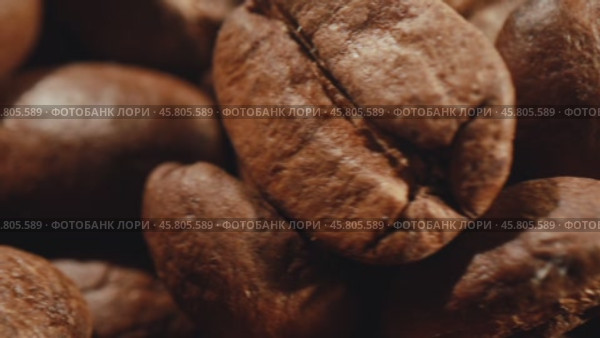 Coffee beans close-up. Стоковое видео, видеограф Андрей Армягов / Фотобанк Лори