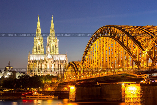 Cologne Cathedral and Hohenzollern Bridge, Cologne, Germany. Стоковое фото, агентство Ingram Publishing / Фотобанк Лори
