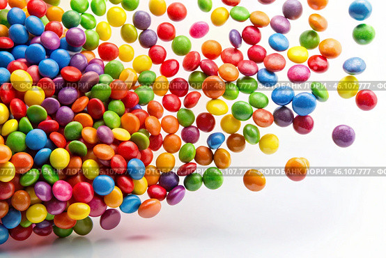 Colorful dragee candies in the assortment on a white background. Various sweets, confectionery and dragees of different shapes and colors. Bright rainbow hues. Стоковое AI-изображение, AI-художник Photojuli / Фотобанк Лори
