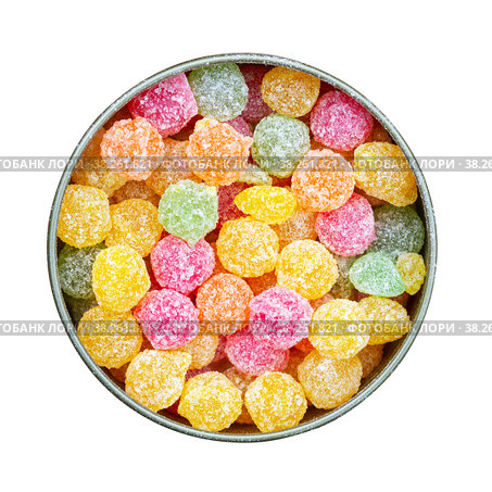Colorful multicolored sucking sweets Montpensier lollipops in a round tin box isolated on a white background close-up top view flat lay. Стоковое фото, фотограф Андрей С / Фотобанк Лори