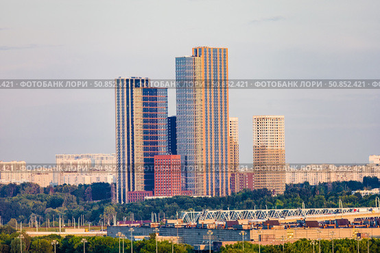 Colorful urban landscape with tall residential skyscrapers. Стоковое фото, фотограф Константин Григорьев / Фотобанк Лори
