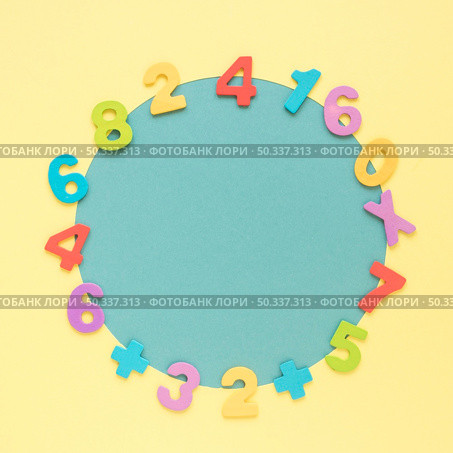 colourful math numbers frame surrounding blue circular shape. Стоковое фото, агентство Ingram Publishing / Фотобанк Лори
