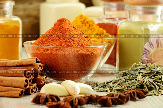 Composition with variety of spices on kitchen table. Стоковое фото, агентство Ingram Publishing / Фотобанк Лори