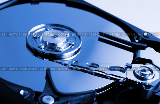 Computer hard drive in blue tone. Стоковое фото, агентство Ingram Publishing / Фотобанк Лори