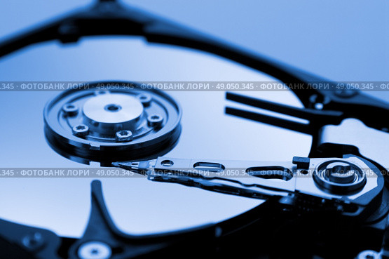 Computer hard drive in blue tone. Стоковое фото, агентство Ingram Publishing / Фотобанк Лори