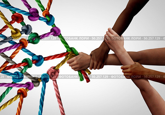 Concept of business team as a group of diverse people pulling together in collaborative support as a teamwork effort to win. Стоковое фото, агентство Ingram Publishing / Фотобанк Лори