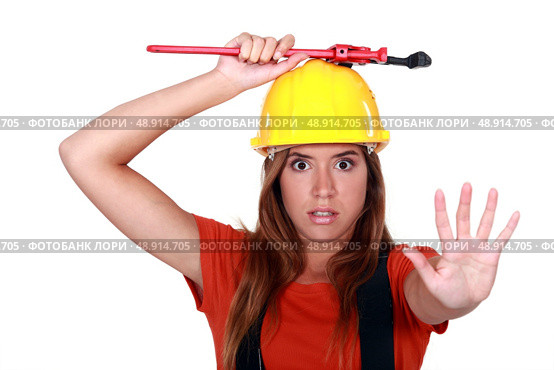 Concerned woman holding up her hand. Стоковое фото, агентство Ingram Publishing / Фотобанк Лори