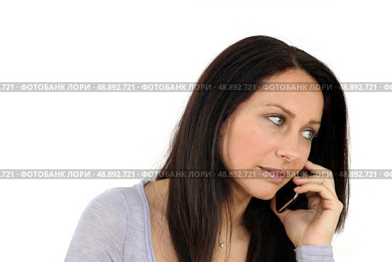 Concerned woman on mobile telephone. Стоковое фото, агентство Ingram Publishing / Фотобанк Лори