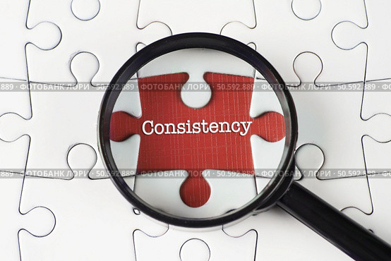 "Consistency" text on missing puzzle with magnifying glass on it searching for missing puzzle peace. "consistency",Text,On,Missing,Puzzle,With,Magnifying,Glass,On,It. Стоковое фото, агентство Ingram Publishing / Фотобанк Лори