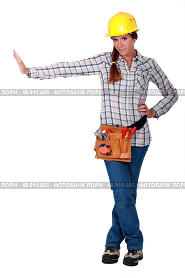 craftswoman making a stop sign. Стоковое фото, агентство Ingram Publishing / Фотобанк Лори