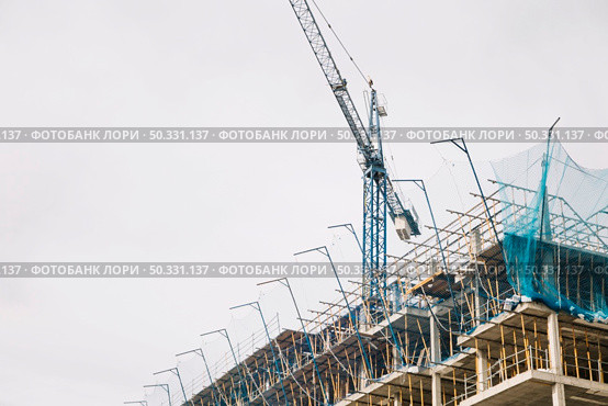 crane building construction. High resolution photo. crane building construction. High quality photo. Стоковое фото, агентство Ingram Publishing / Фотобанк Лори
