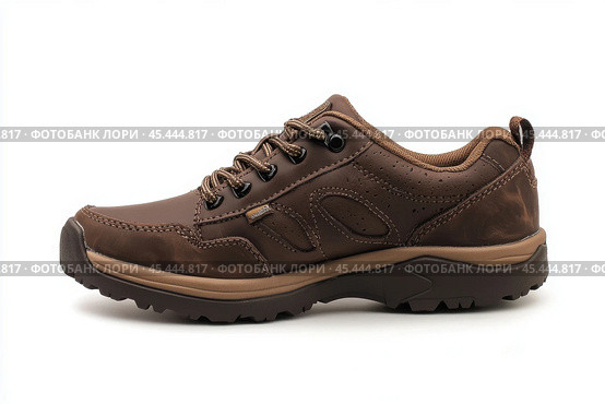 Dark brown leather lace-up running shoes with low tops, thick soles. The laces and black rubber outsole. Sporty look. Men to wear during outdoor activities, hiking. Brown shoes. Trendy Male Boots Pair. Стоковое AI-изображение, AI-художник Марина Демидюк / Фотобанк Лори
