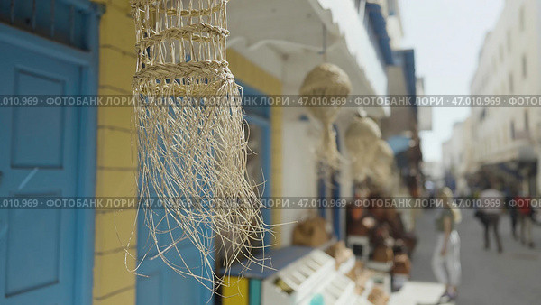 Decorative elements hanging and swaying in the wind. Стоковое фото, фотограф David Kashakhi / Фотобанк Лори