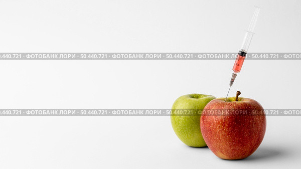 delicious apple gmo modified food 3. Стоковое фото, агентство Ingram Publishing / Фотобанк Лори