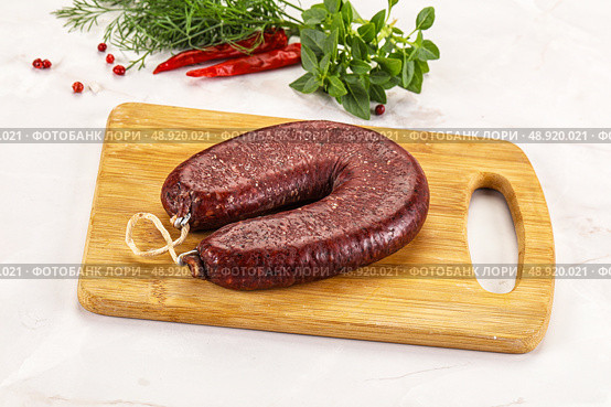 Delicious dry cured beef basturma on table, closeup. Стоковое фото, фотограф Андрей Старостин / Фотобанк Лори