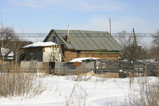 Деревенский дом зимой (2010 год). Стоковое фото, фотограф Наталия Шевченко / Фотобанк Лори