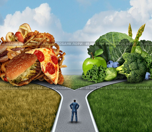 Diet decision concept and nutrition choices dilemma between healthy good fresh fruit and vegetables or greasy cholesterol rich fast food with a man on a crossroad trying to decide what to eat for the best lifestyle choice. Стоковое фото, агентство Ingram Publishing / Фотобанк Лори
